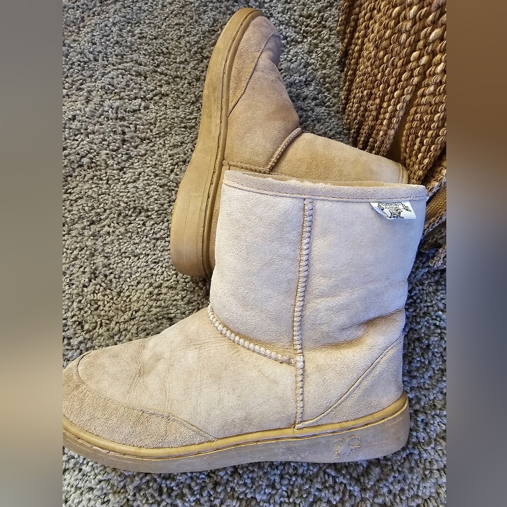 Shearling booties. Good sole nice inside. Warm and cozy indoor outdoor use.